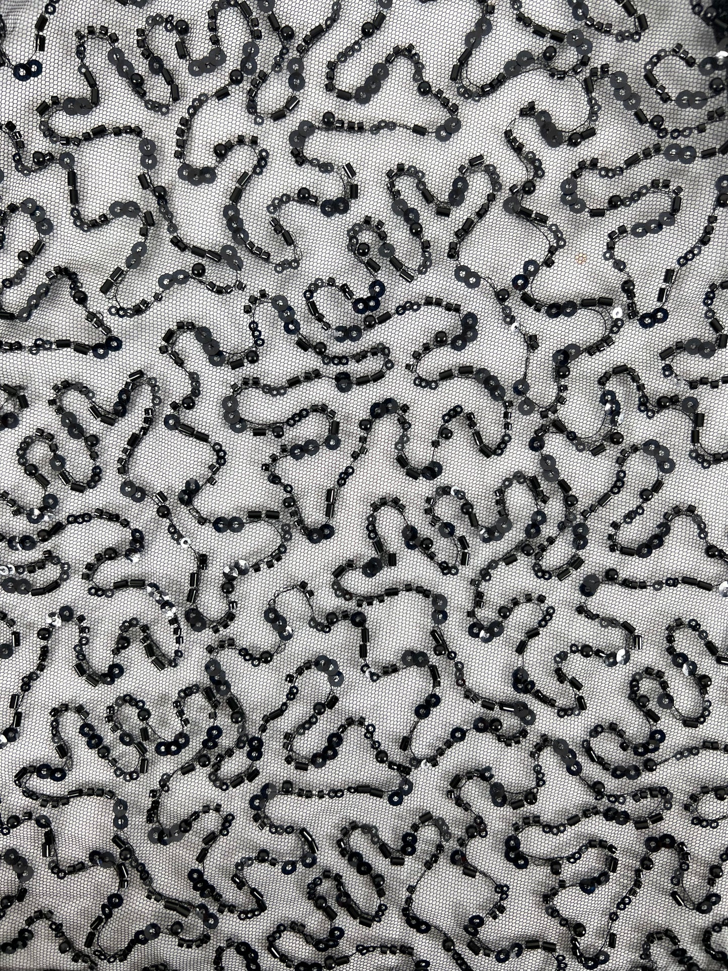 Channel your inner goddess and make a statement with this beautiful, delicately hand-beaded fabric. Perfect for your special occasion You will receive 6 yards of fabric (approximately 5.4 meters, lining not included) Small samples are available for UK shipping only. Free worldwide shipping.