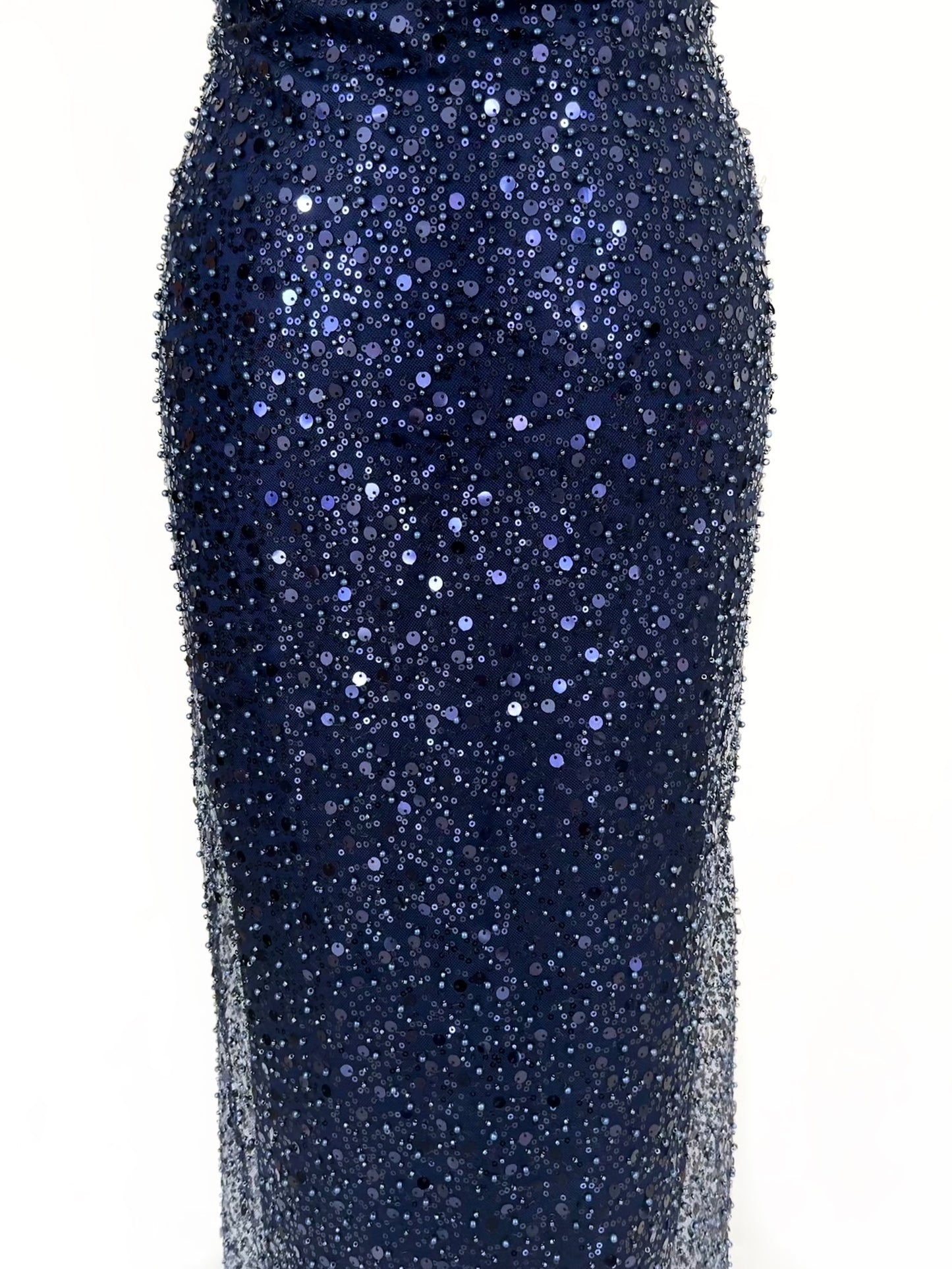 Inspired by Nyx the goddess of the night, feel empowered walking into any room. This stunning midnight blue lightweight mesh is covered elegantly in beads and sequins perfect for your special occasion. You will receive 6 yards of fabric (approximately 5.4 meters, lining not included) Small samples are available for UK shipping only. Free worldwide shipping.