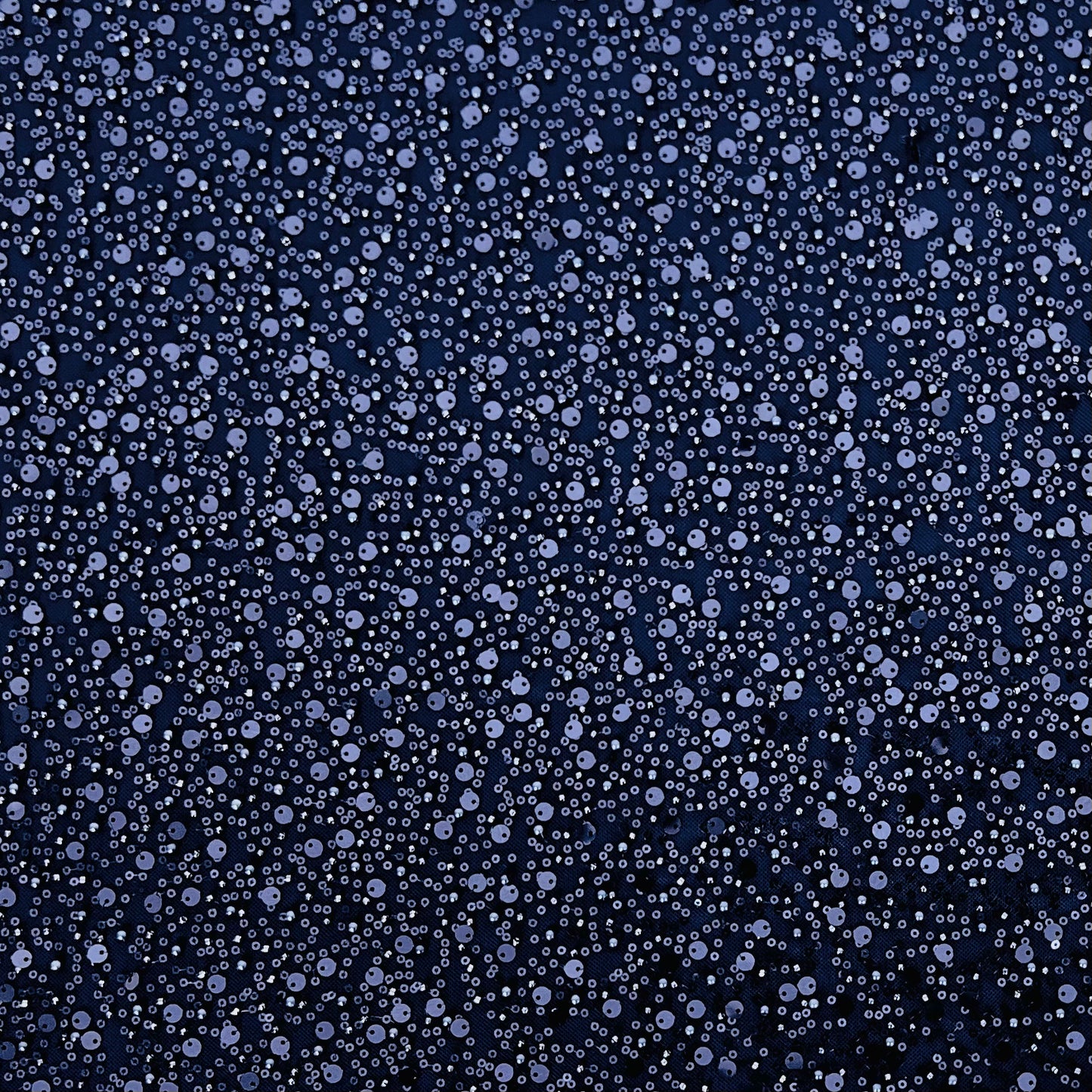 Inspired by Nyx the goddess of the night, feel empowered walking into any room. This stunning midnight blue lightweight mesh is covered elegantly in beads and sequins perfect for your special occasion. You will receive 6 yards of fabric (approximately 5.4 meters, lining not included) Small samples are available for UK shipping only. Free worldwide shipping.