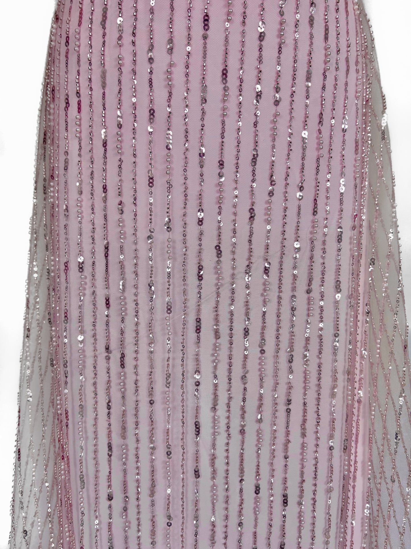 Named after the violet amethyst quartz this beautiful piece has a mixture of beads, pearls, and sequins on a light weight lace perfect for those wanting an elegant and effortless look.   Colour: Pink with a purple undertone (mauve)  You will receive 6 yards of fabric (approximately 5.4 meters, lining not included)  Small samples are available for UK shipping only.   Free worldwide shipping.