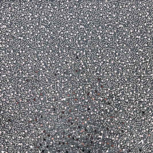 Shine as bright as the moon shines in the night skies for your special occasion. Sparkle in this silver lightweight mesh covered elegantly in beads and sequins, perfect for your special occasion.  You will receive 6 yards of fabric (approximately 5.4 meters, lining not included)  Small samples are available for UK shipping only.  Free worldwide shipping.