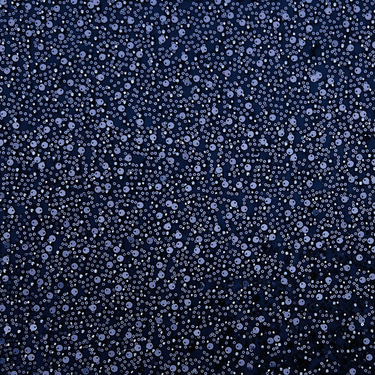 Inspired by Nyx the goddess of the night, feel empowered walking into any room. This stunning midnight blue lightweight mesh is covered elegantly in beads and sequins perfect for your special occasion.  You will receive 6 yards of fabric (approximately 5.4 meters, lining not included)  Small samples are available for UK shipping only.  Free worldwide shipping.